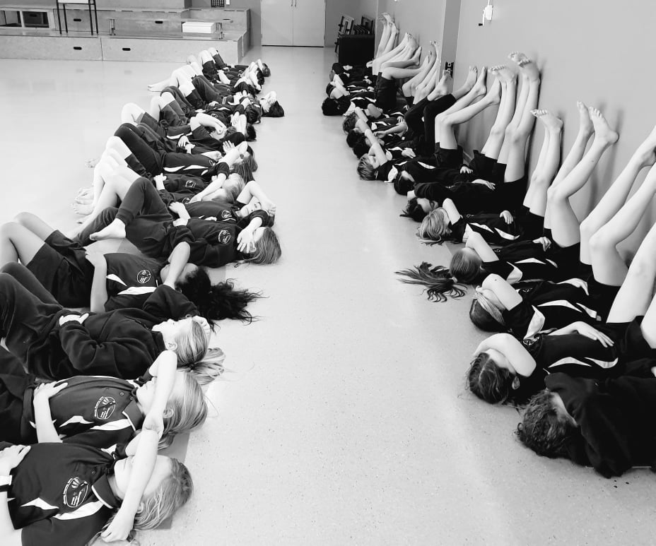 Kids yoga svasana black and white.jpg